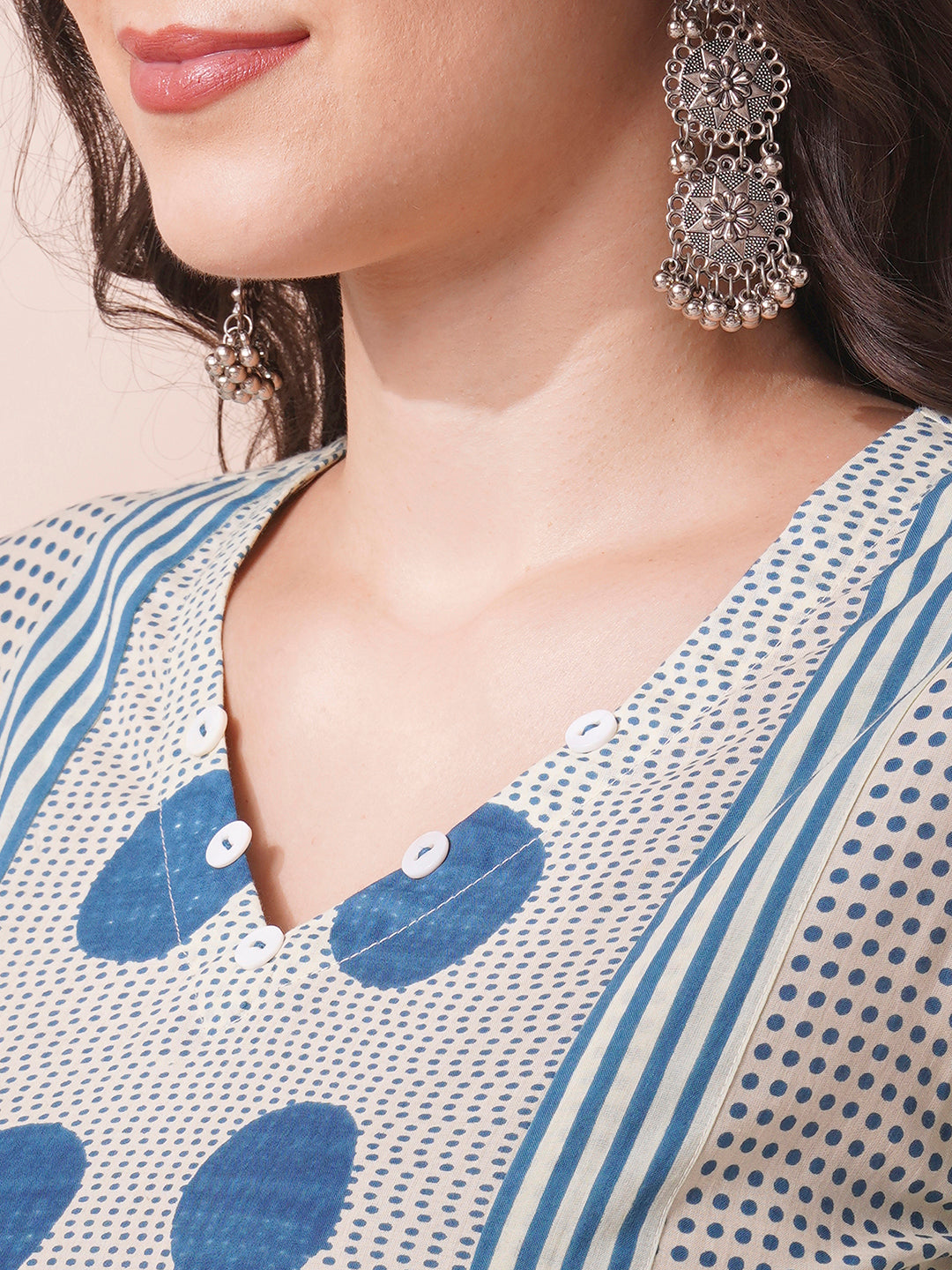 A-line print mix-match kurta with button detailing and bell sleeves.