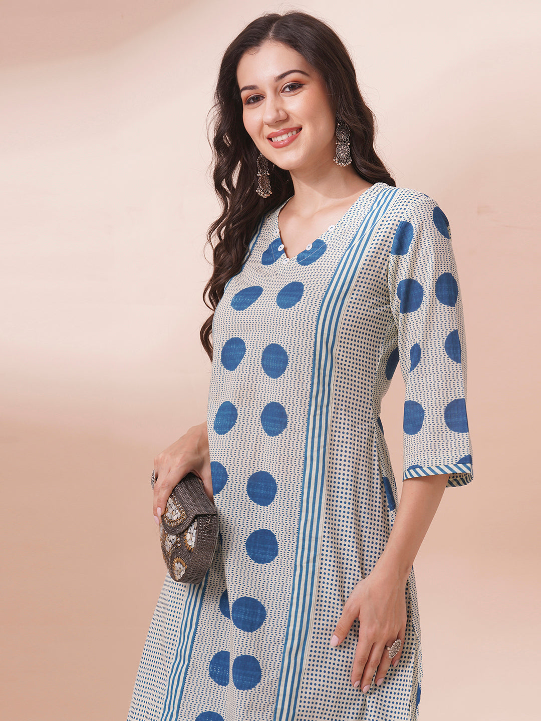 A-line print mix-match kurta with button detailing and bell sleeves.