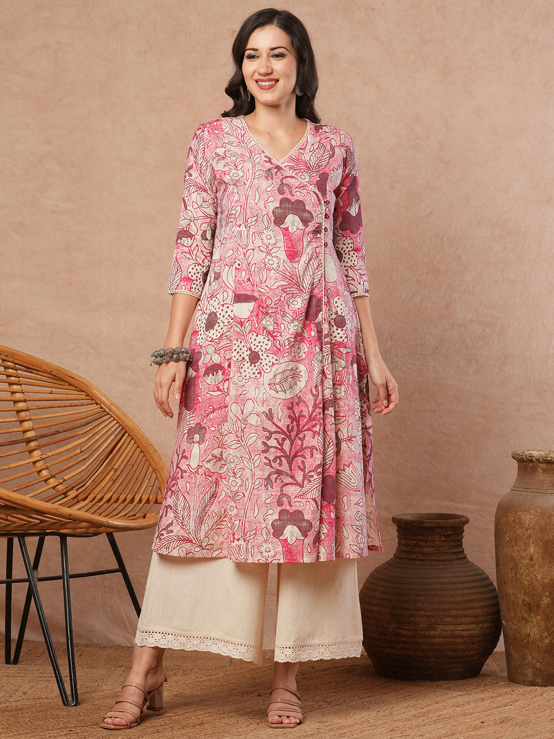 Printed A-line wrap around kurta with lace detailing.