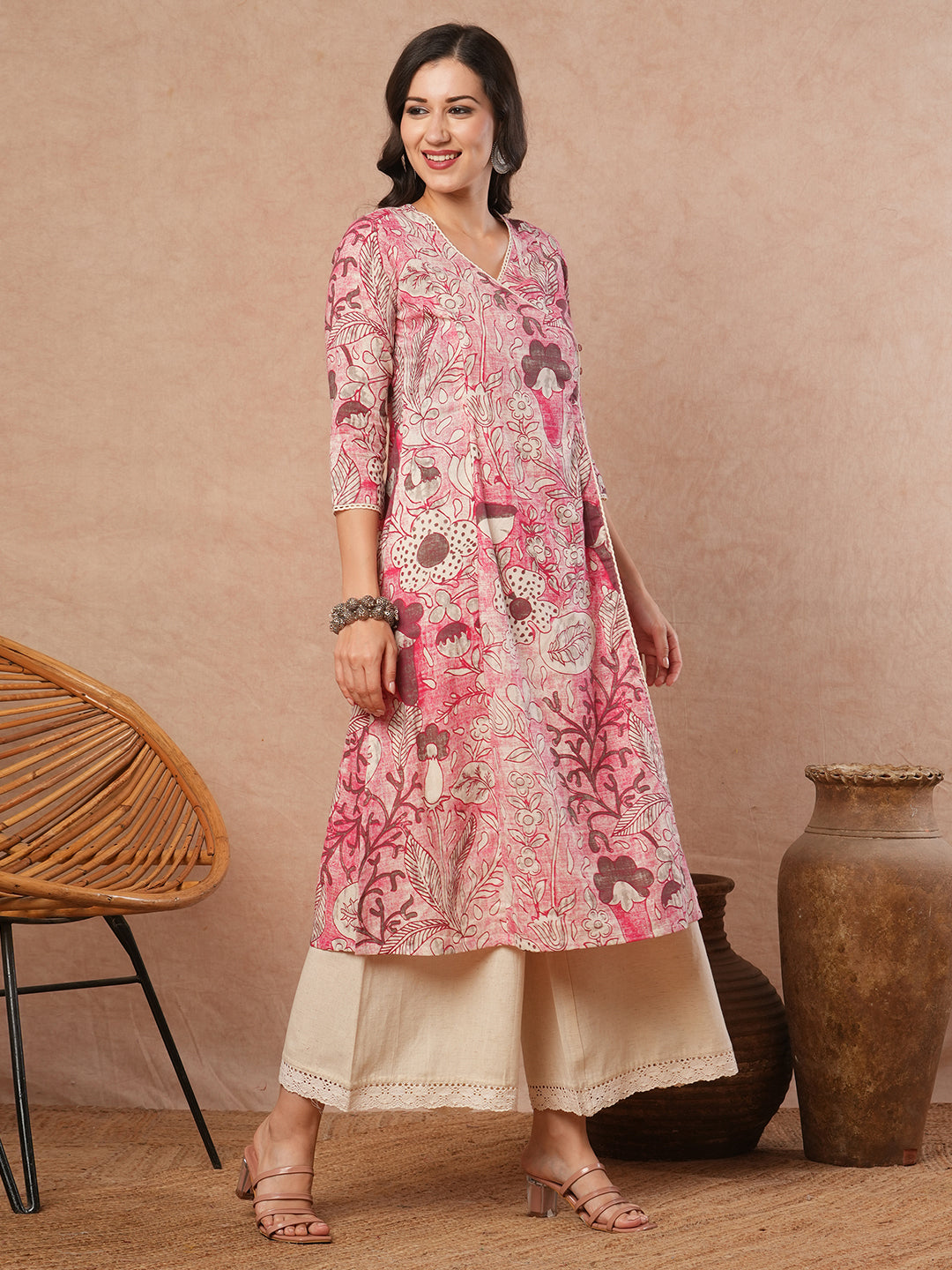 Printed A-line wrap around kurta with lace detailing.