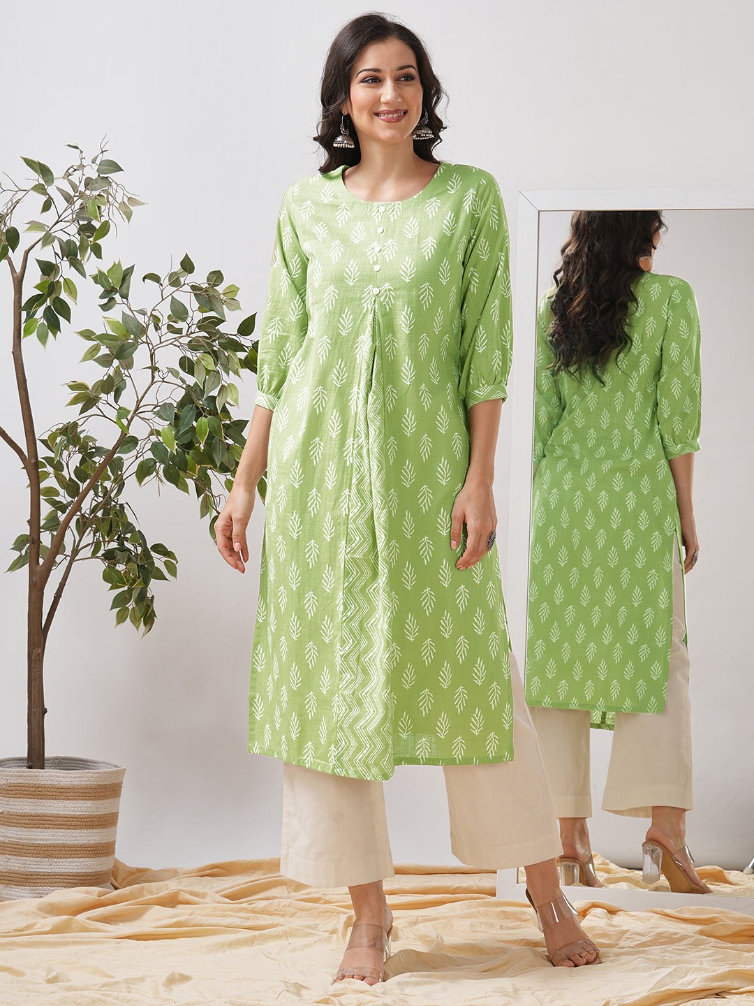Straight fit kurta with cut and sew trim fabric centre pleat and gathered sleeves.