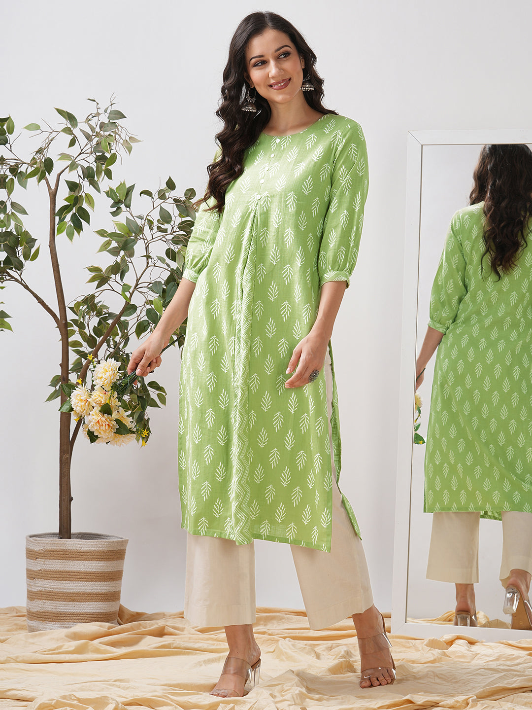 Straight fit kurta with cut and sew trim fabric centre pleat and gathered sleeves.