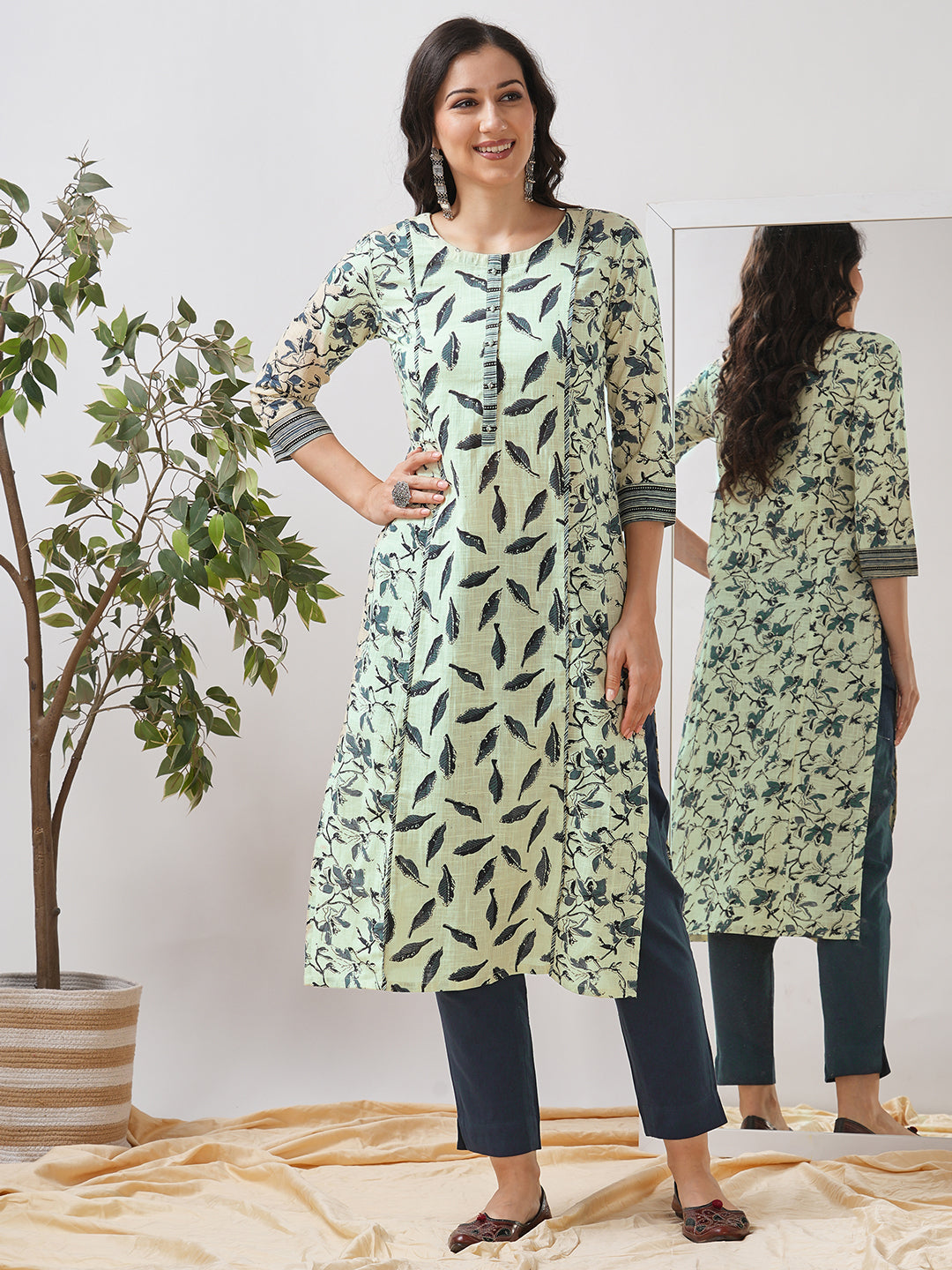 Straight fit shoulder princess kurta with piping between the seams and placket.