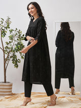 A gathered kurta with mirrorwork shoulder yoke and cuffed sleeves.
