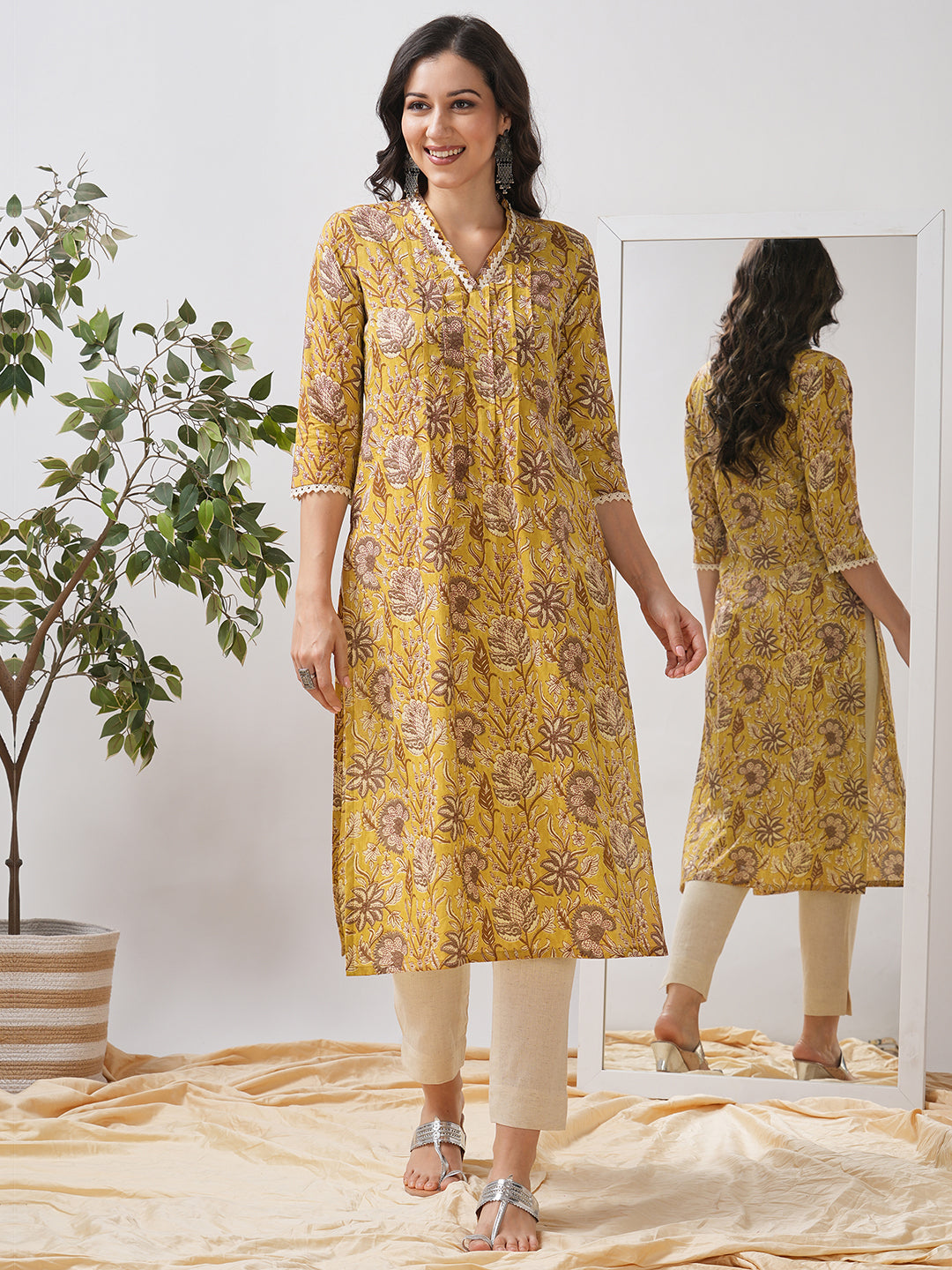 Mustard Yellow Floral Printed Straight Kurta with Lace Detailing.