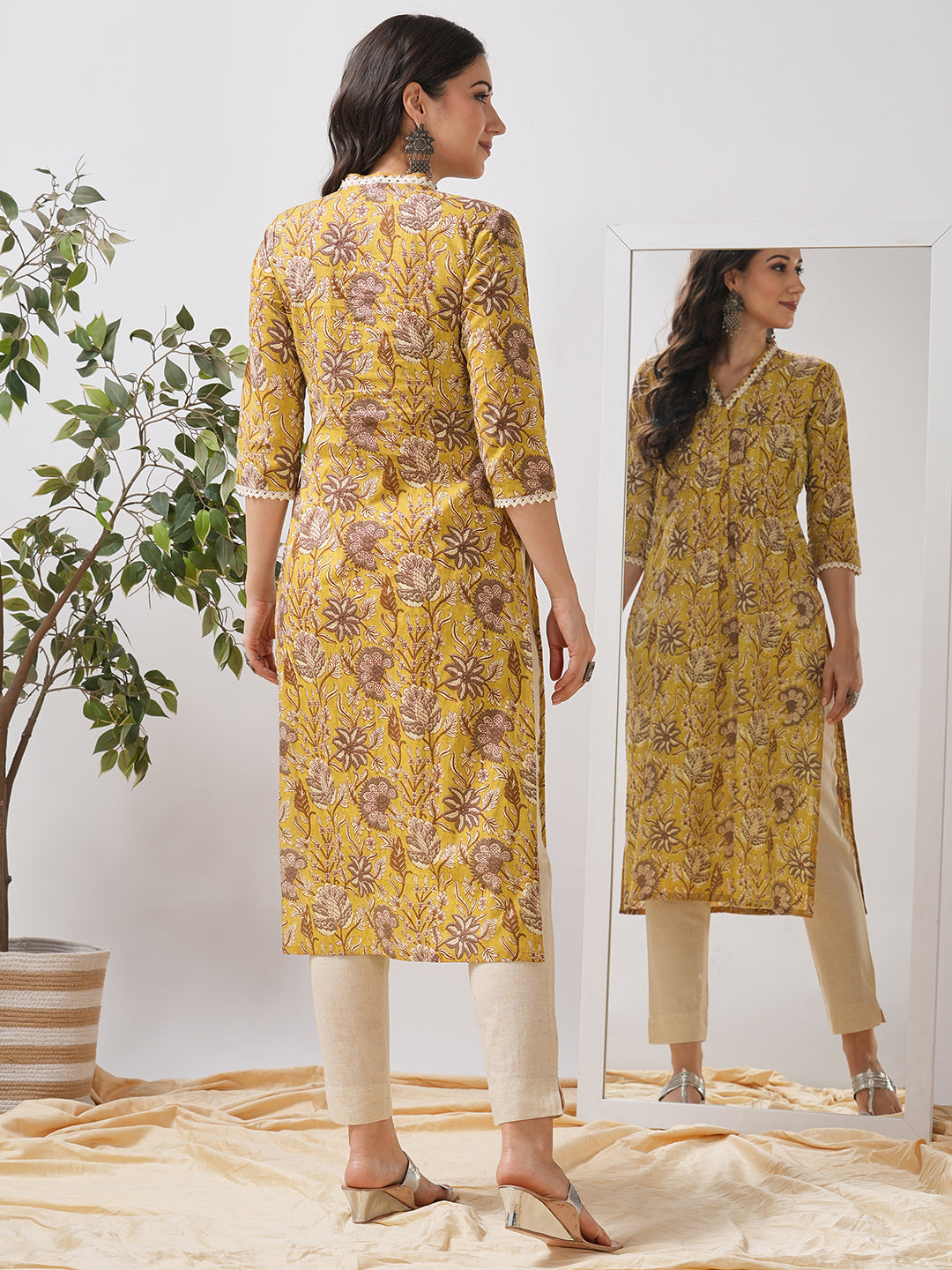 Mustard Yellow Floral Printed Straight Kurta with Lace Detailing.