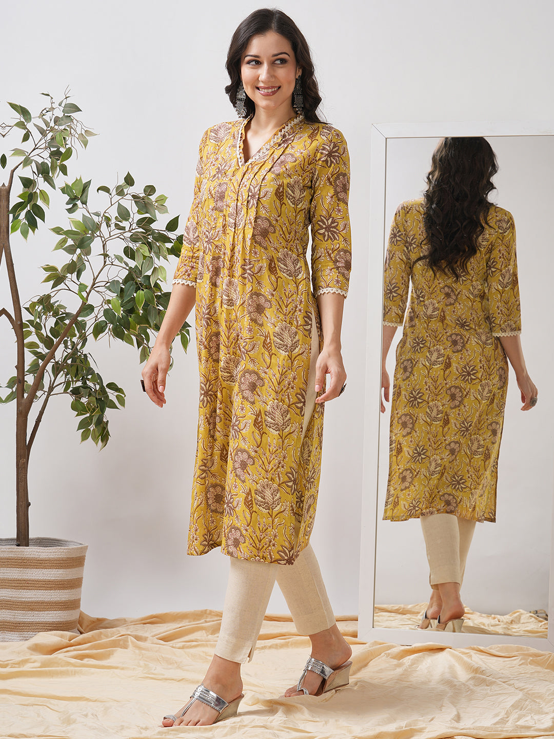 Mustard Yellow Floral Printed Straight Kurta with Lace Detailing.