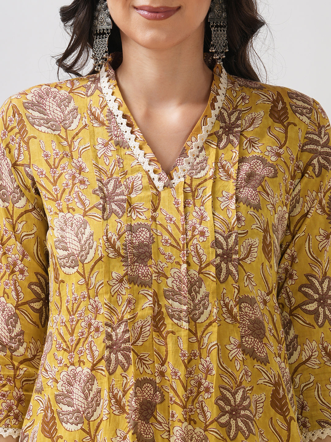 Mustard Yellow Floral Printed Straight Kurta with Lace Detailing.