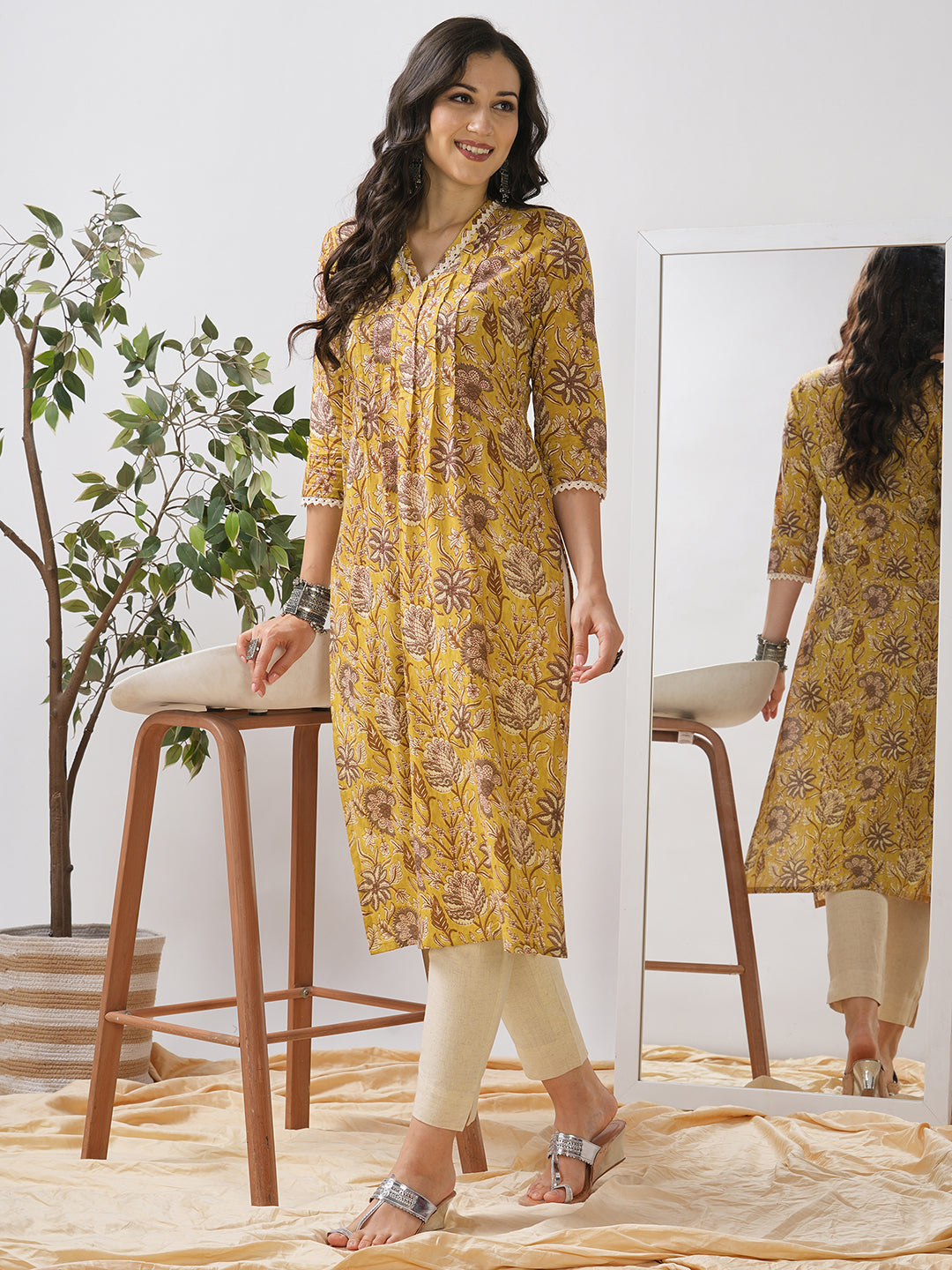 Mustard Yellow Floral Printed Straight Kurta with Lace Detailing.