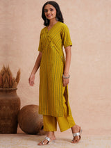 Straight fit kurta set with half sleeves and button detailing paired with plain palazzo.