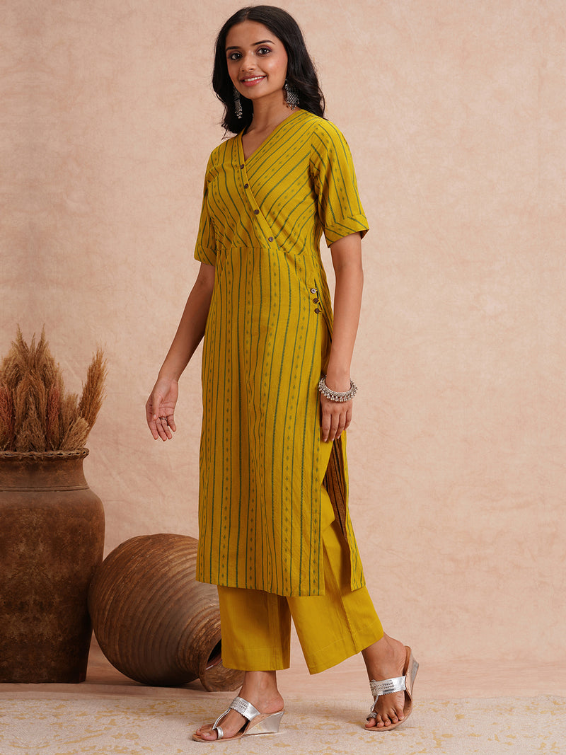 Straight fit kurta set with half sleeves and button detailing paired with plain palazzo.