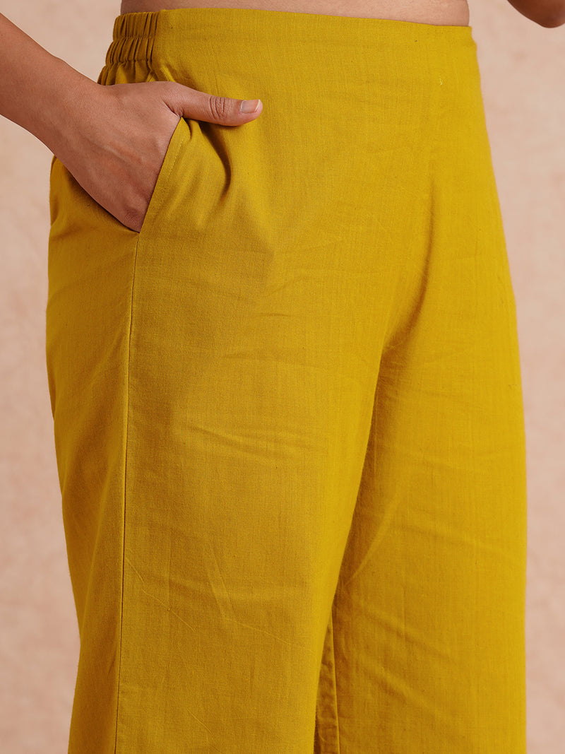 Straight fit kurta set with half sleeves and button detailing paired with plain palazzo.