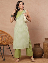 Sleeveless straight kurta with cutwork neckline and mirror work paired with palazzo.