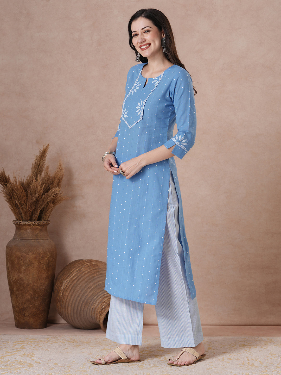 JOYLAND - Straight fit cotton kurta with a shaped block printed yoke and striped piping detail, paired with striped palazzo