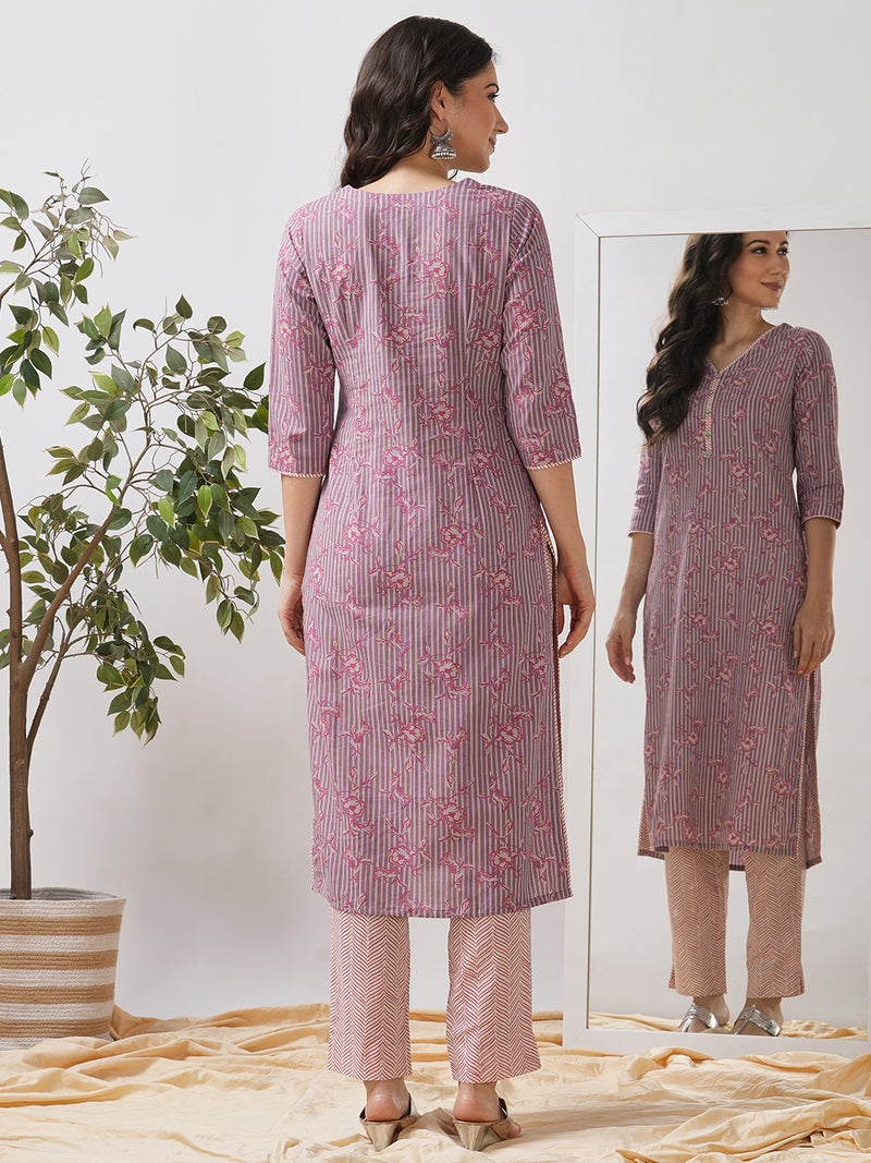 Straight kurta set with piping detailing on neck, sleeves and side slits paired with pant.