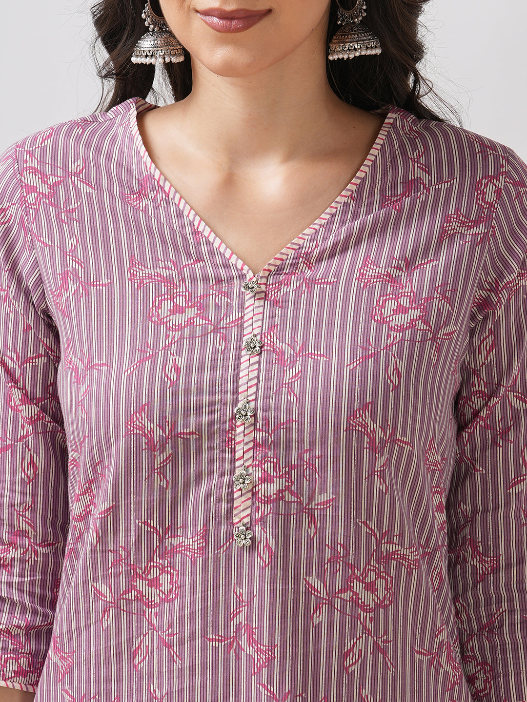 Straight kurta set with piping detailing on neck, sleeves and side slits paired with pant.