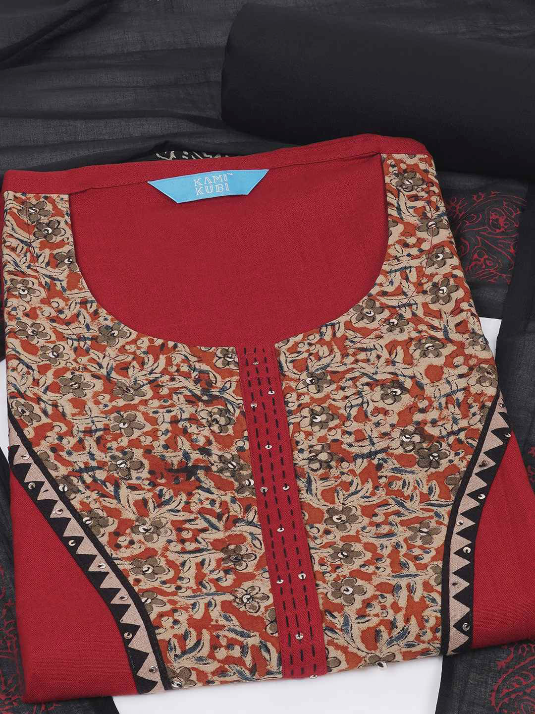 3-piece unstitched set with intricate floral patterns, paired with a contrasting black dupatta & plain bottom.(Maroon)