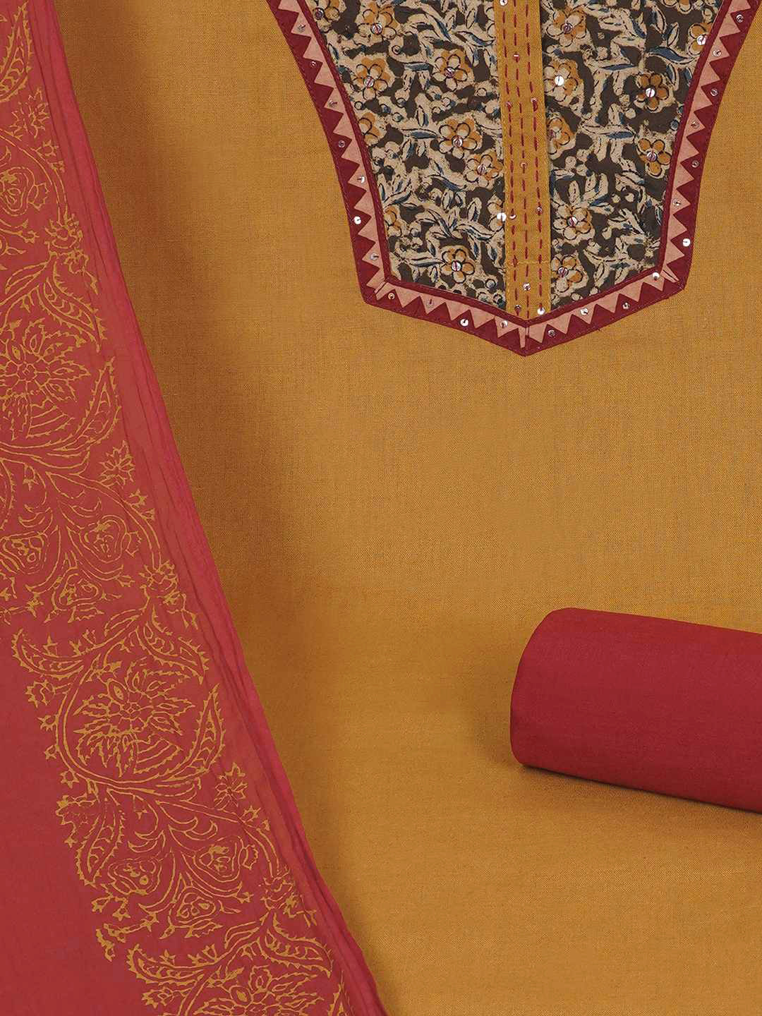 3-piece unstitched set with intricate floral patterns, paired with a contrasting black dupatta & plain bottom.(Yellow)