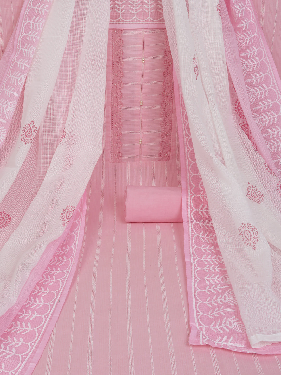 A light pink unstitched suit set with intricate top paired with plain bottom and Kota doria dupatta.