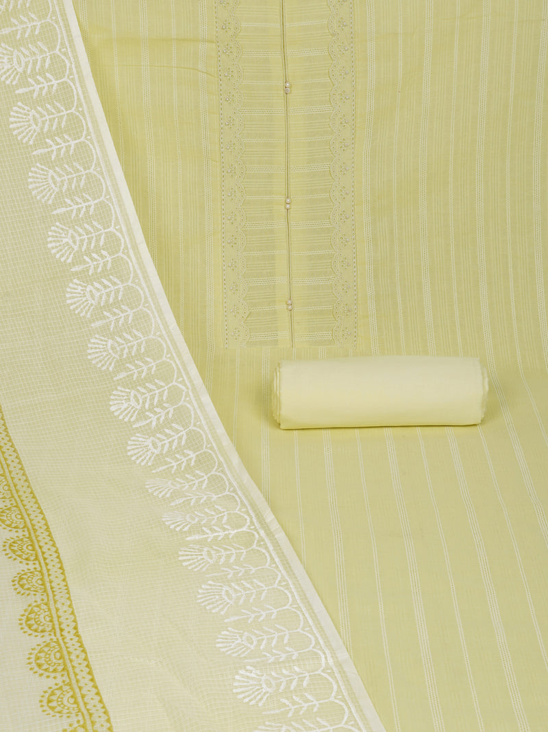 A light yellow unstitched suit set with intricate top paired with plain bottom and Kota doria dupatta.