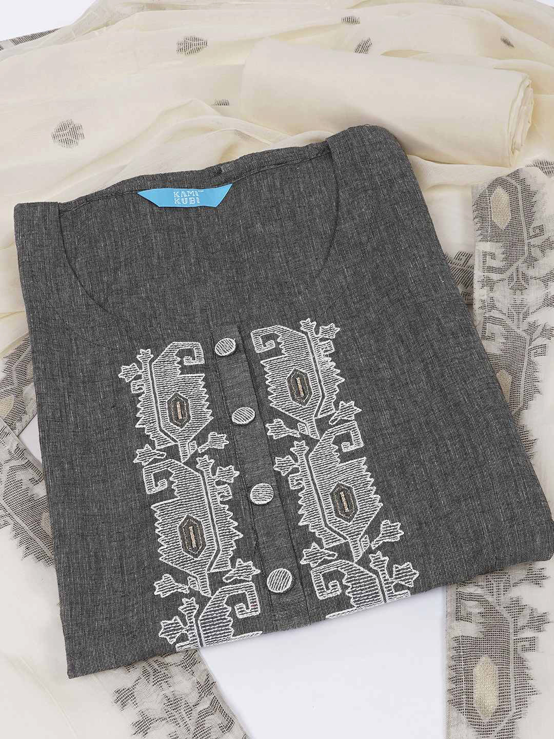 3-piece unstitched set features a black embroidered top paired with a soft cream dupatta showcasing subtle woven motifs.