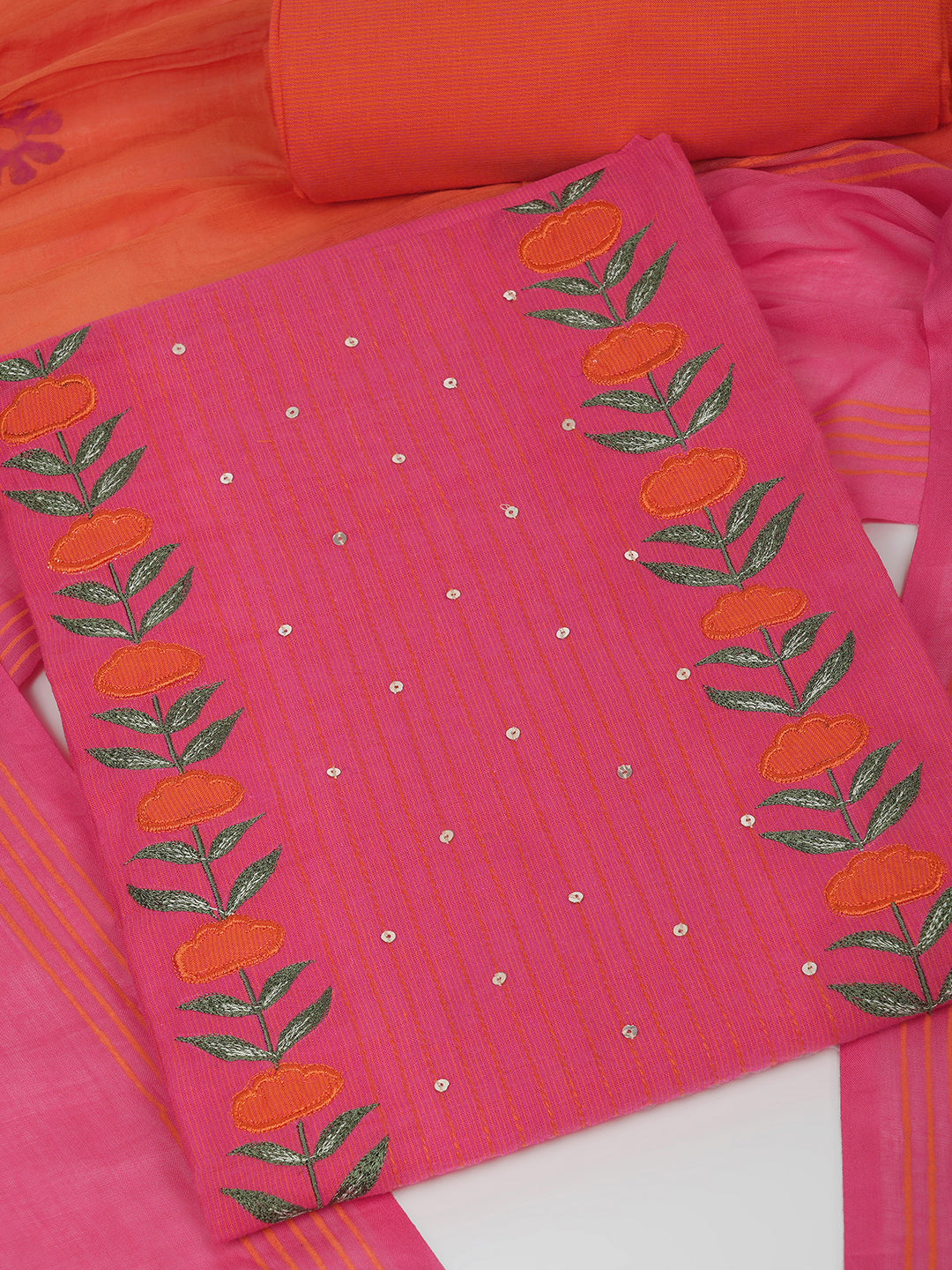 3-piece suit set with a floral applique yoke, paired with contrasting bottoms and block-printed dupatta.