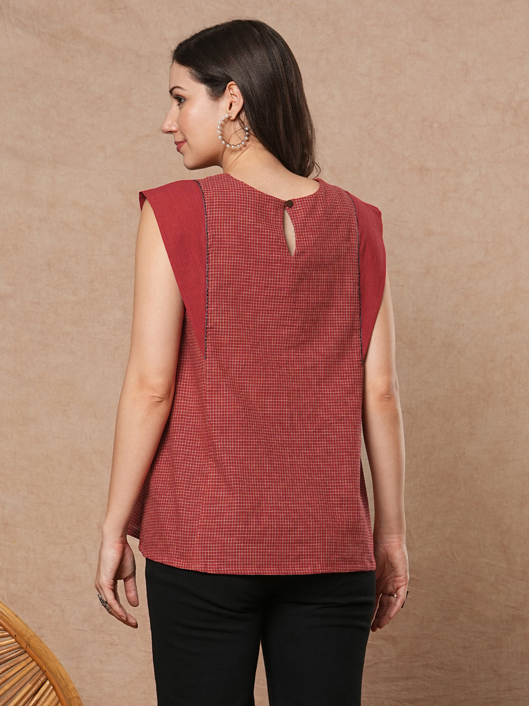 Flared top in chequered cotton fabric with hand embroidered running stitch