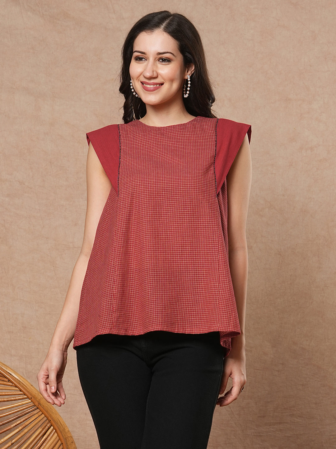 Flared top in chequered cotton fabric with hand embroidered running stitch