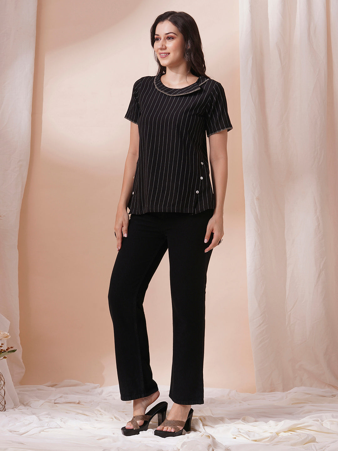 Striped cotton top with constructed collar and button detailing with hand embroidery.