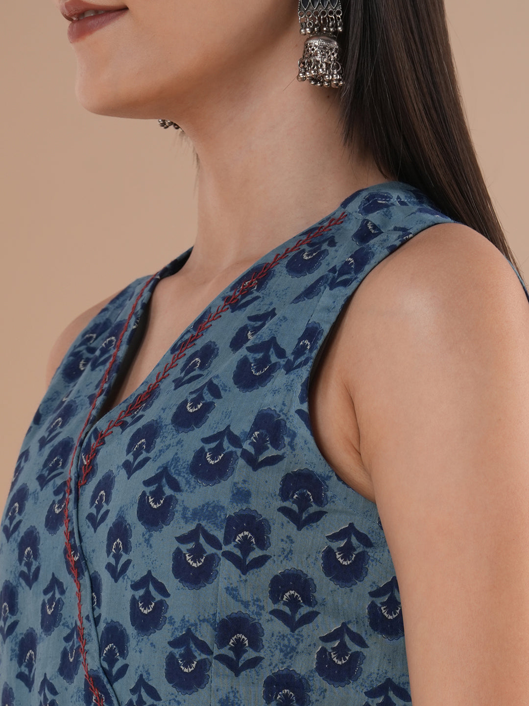 Sleeveless cotton print top with hand embroidered feather stitch and tassels