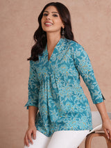 Printed top with knife pleat detailing and a V-neckline.