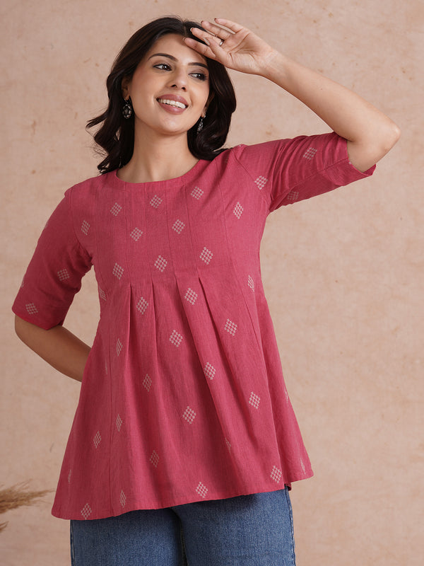 Pleated top with dobby fabric panels and elbow sleeves.