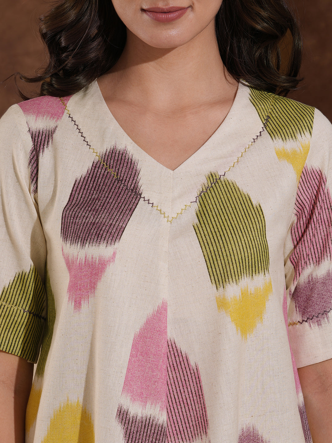 V-Neck cotton flex shirt dress in an 'ikat' weave inspired print with handwork.