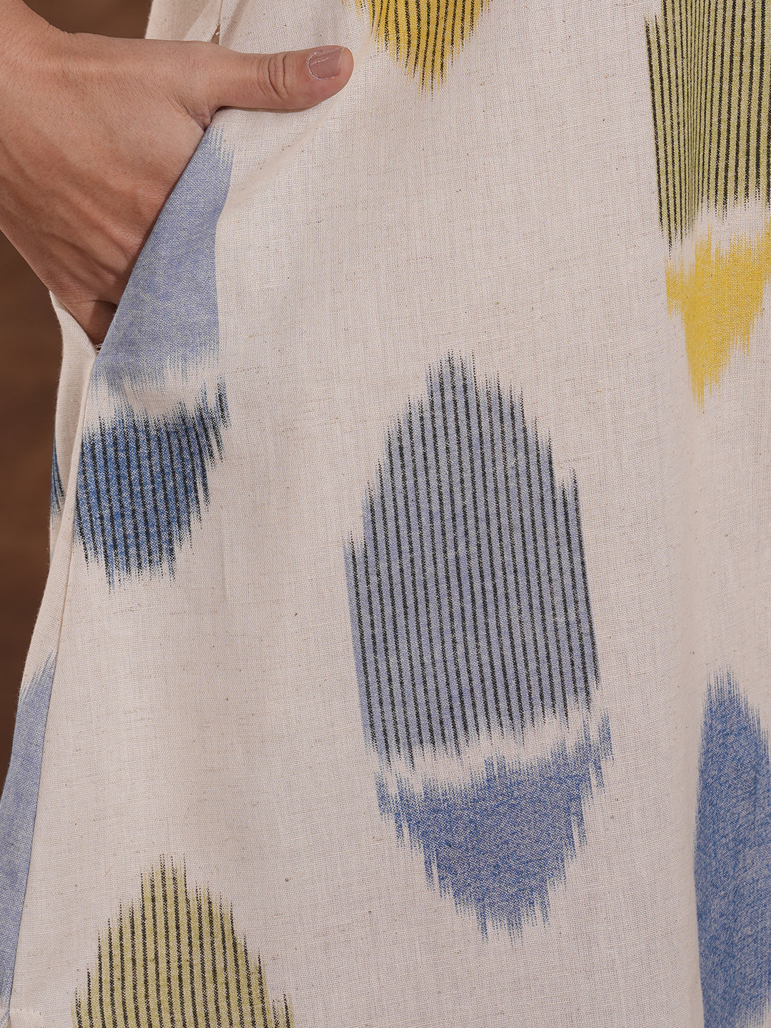 Shirt collared cotton flex dress in an 'ikat' weave inspired print with handwork.