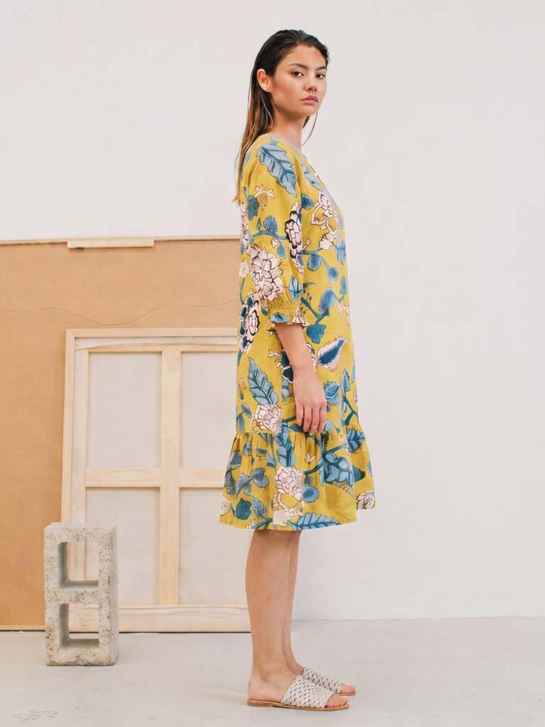 JOYLAND-A-Line Cotton Floral Printed Dress with Tiered Hem & Smocked Sleeves.