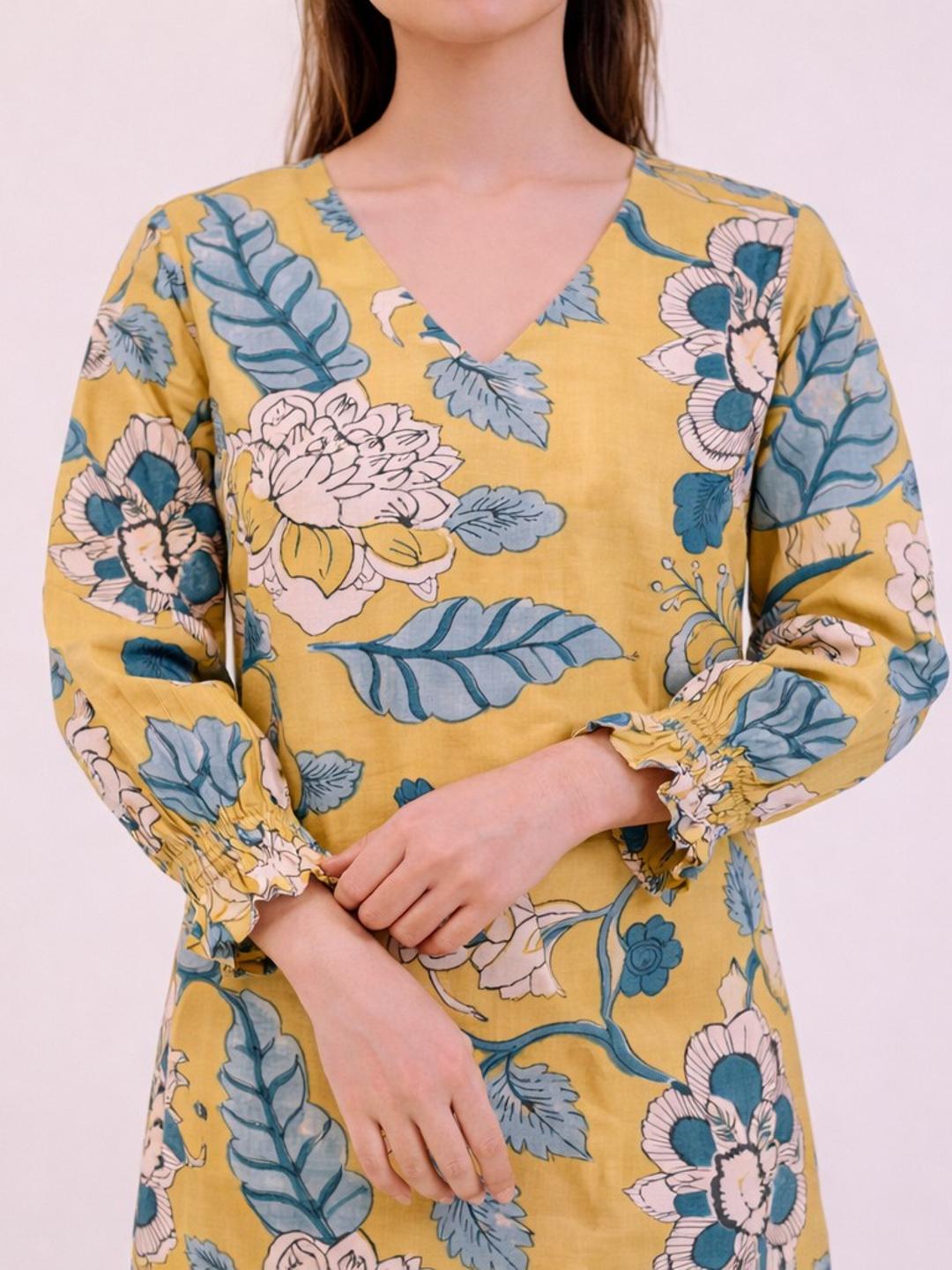 JOYLAND-A-Line Cotton Floral Printed Dress with Tiered Hem & Smocked Sleeves.