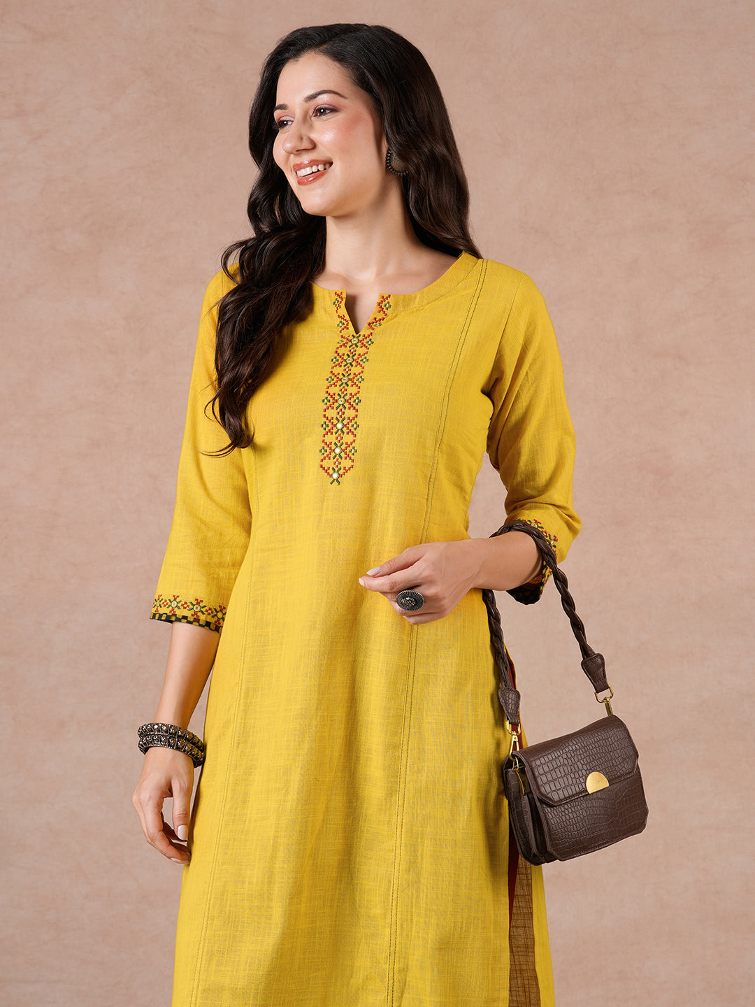 Straight Fit Cotton Slub Kurta with Rabari Embroidery & Block Print Trim.