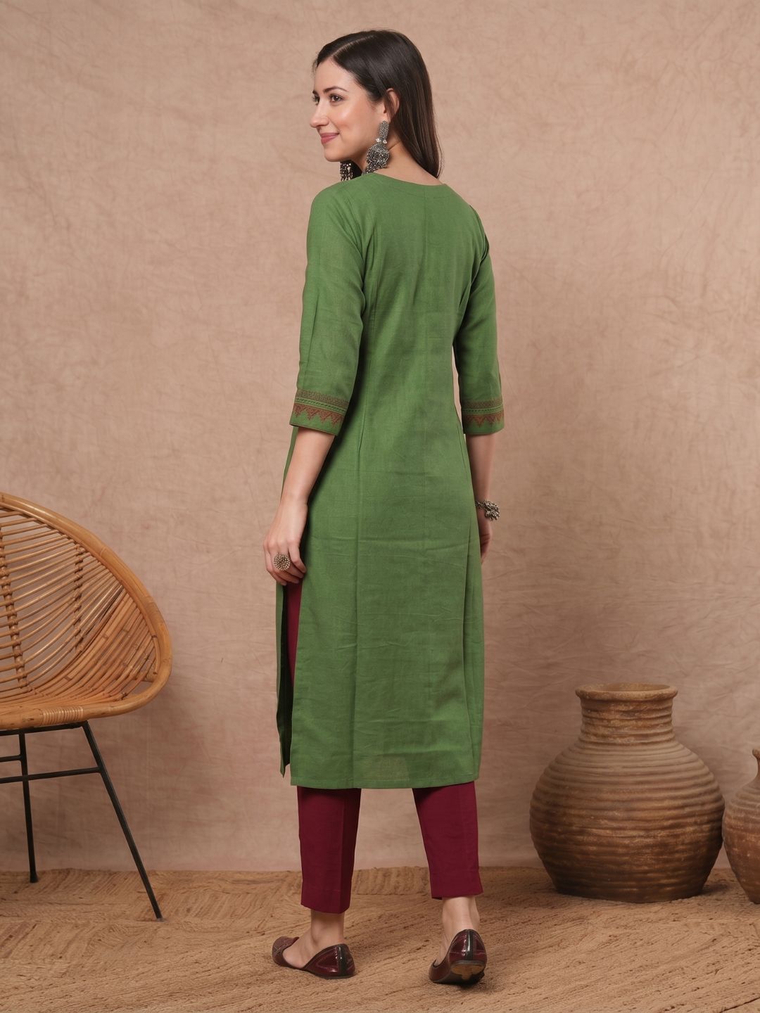 Straight Fit Cotton Kurta with Intricate Embroidered Yoke & Printed Sleeve Detail.
