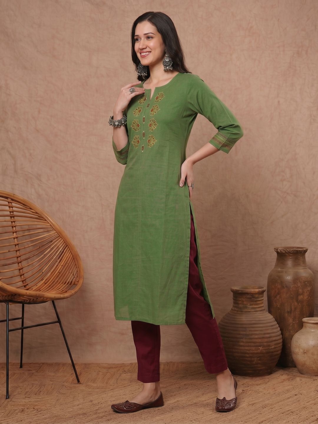 Straight Fit Cotton Kurta with Intricate Embroidered Yoke & Printed Sleeve Detail.