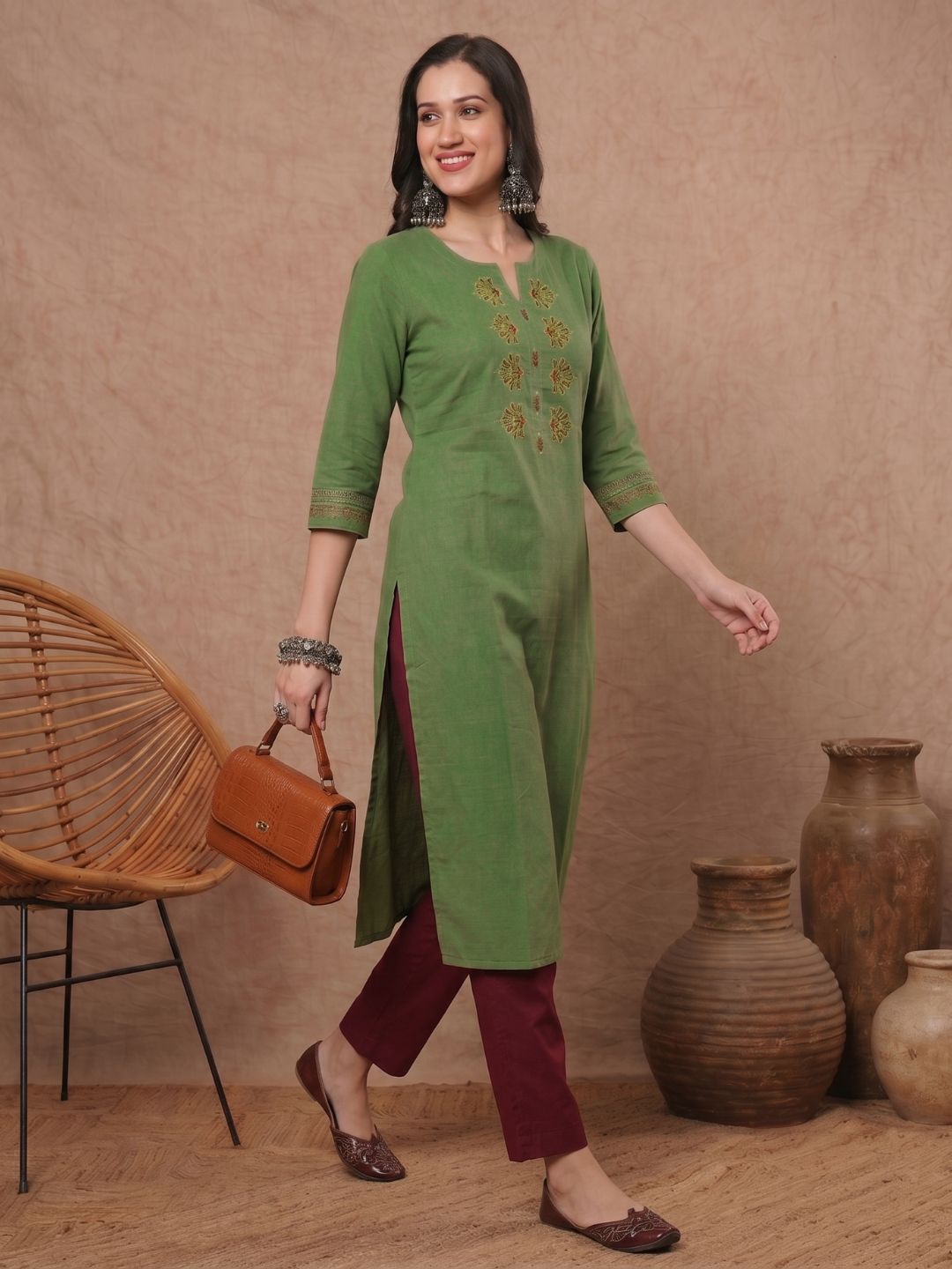 Straight Fit Cotton Kurta with Intricate Embroidered Yoke & Printed Sleeve Detail.
