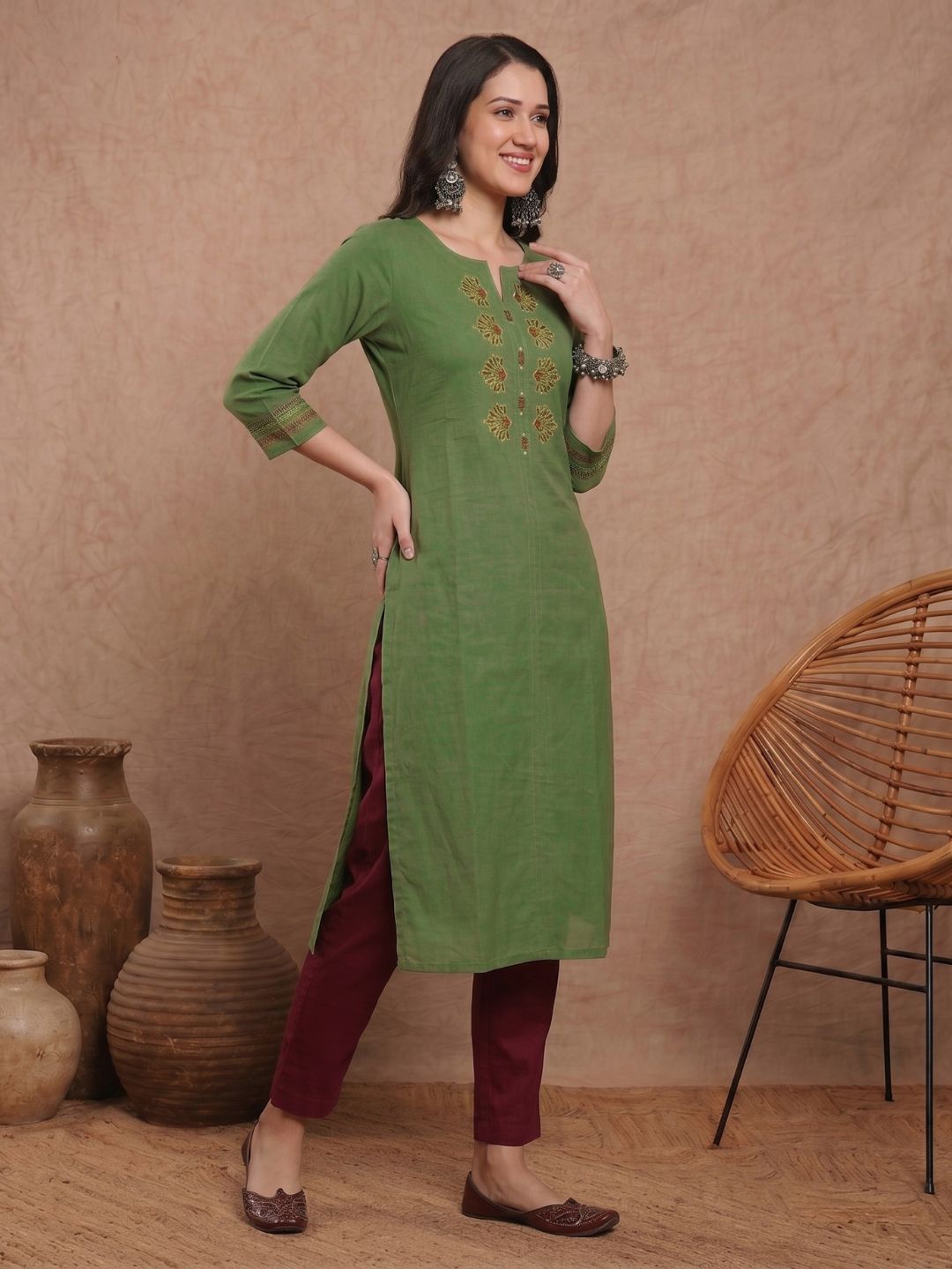 Straight Fit Cotton Kurta with Intricate Embroidered Yoke & Printed Sleeve Detail.