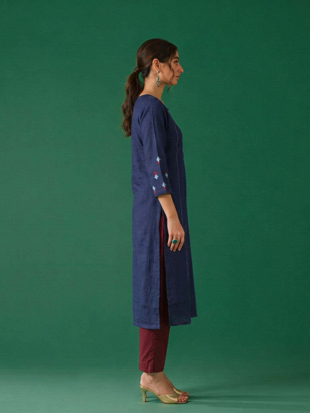 Straight fit cotton slurb kurta with shoulder princess Pannel, hand block print and sequin work.