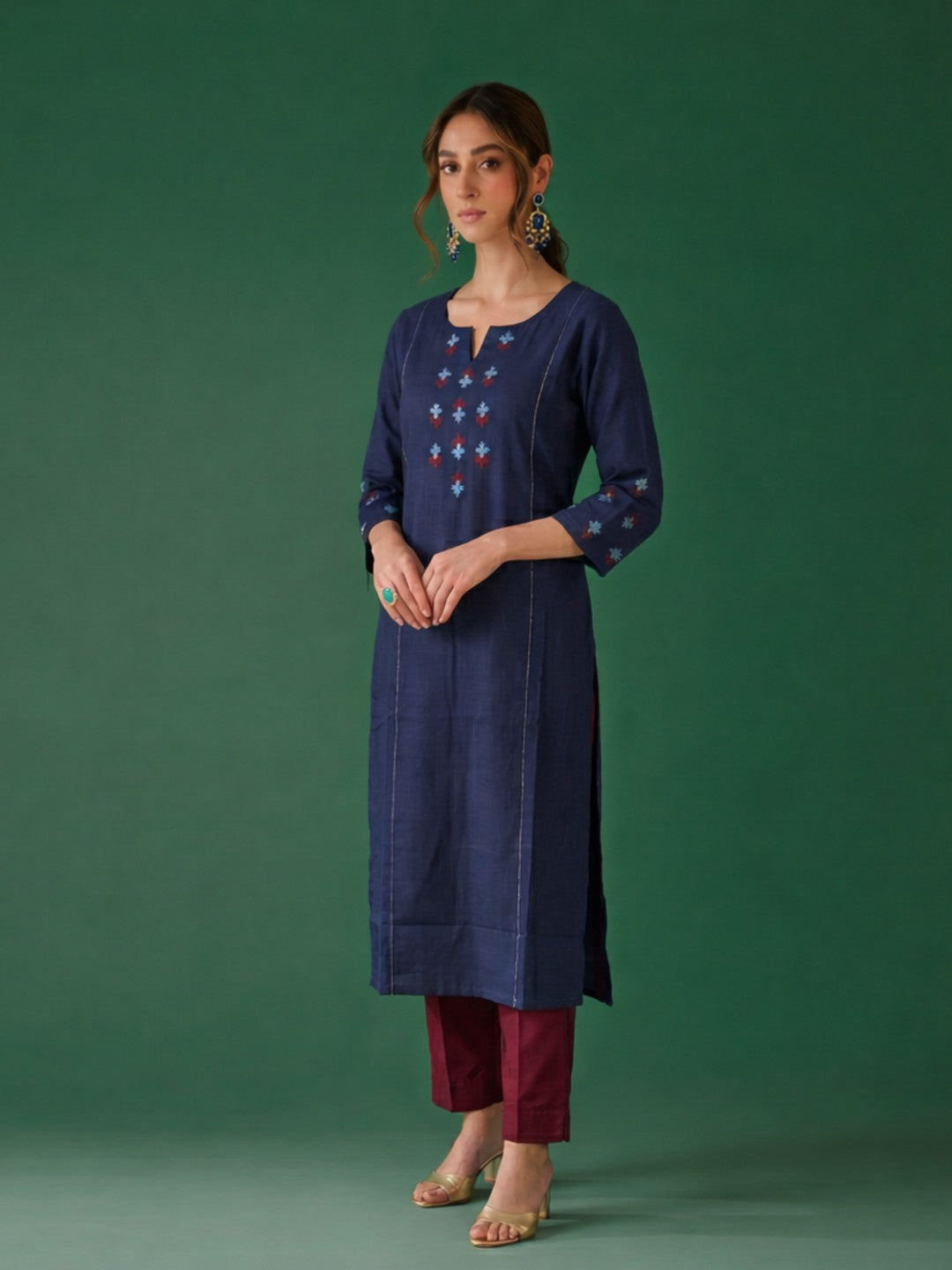 Straight fit cotton slurb kurta with shoulder princess Pannel, hand block print and sequin work.