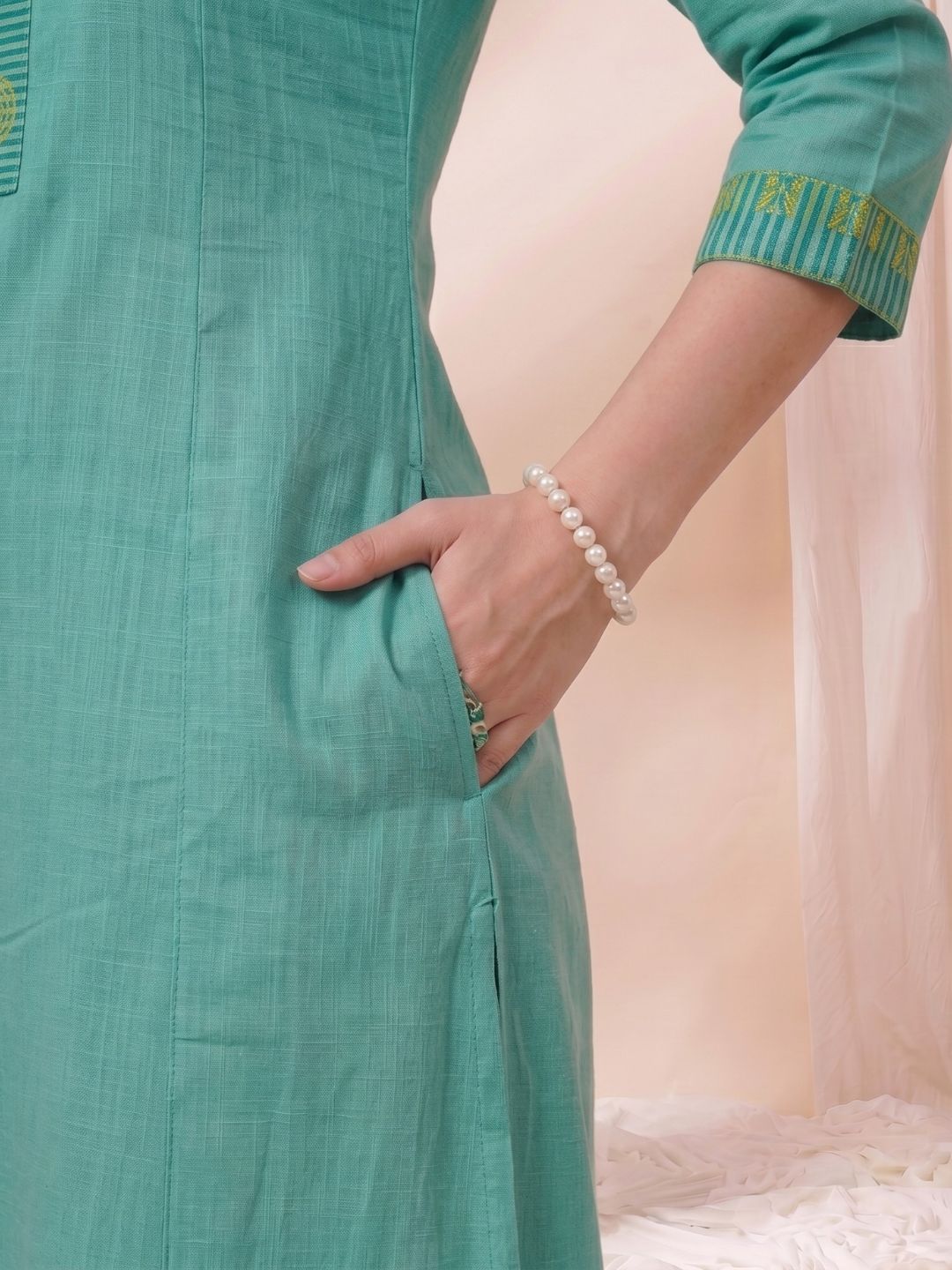 A-Line Cotton Slub Kurta with Hand Block Print & Mirror Work and Princess Panels.