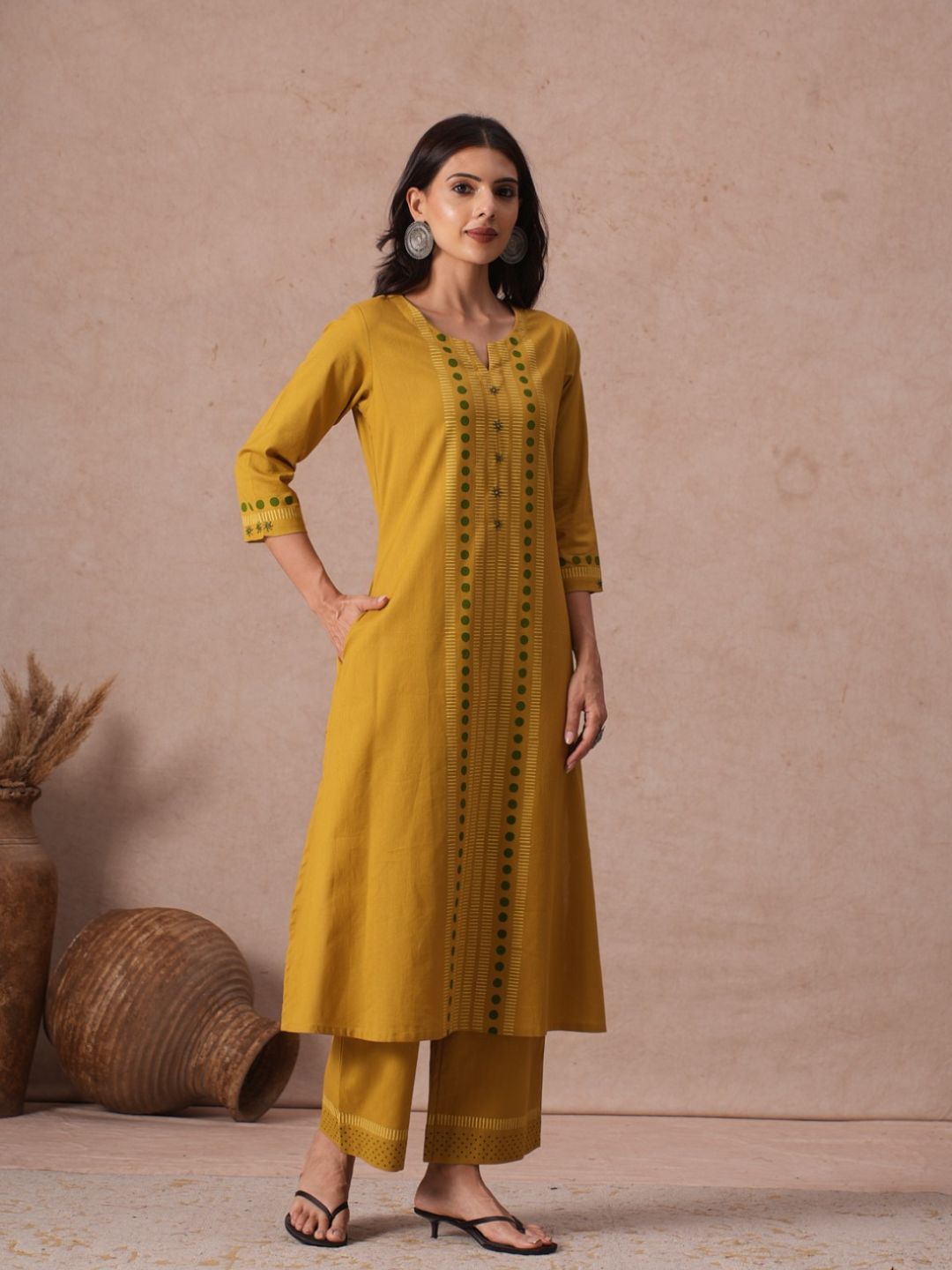 A-Line Cotton Flex Kurta with Hand Block Print and Mirror Work Detailing.
