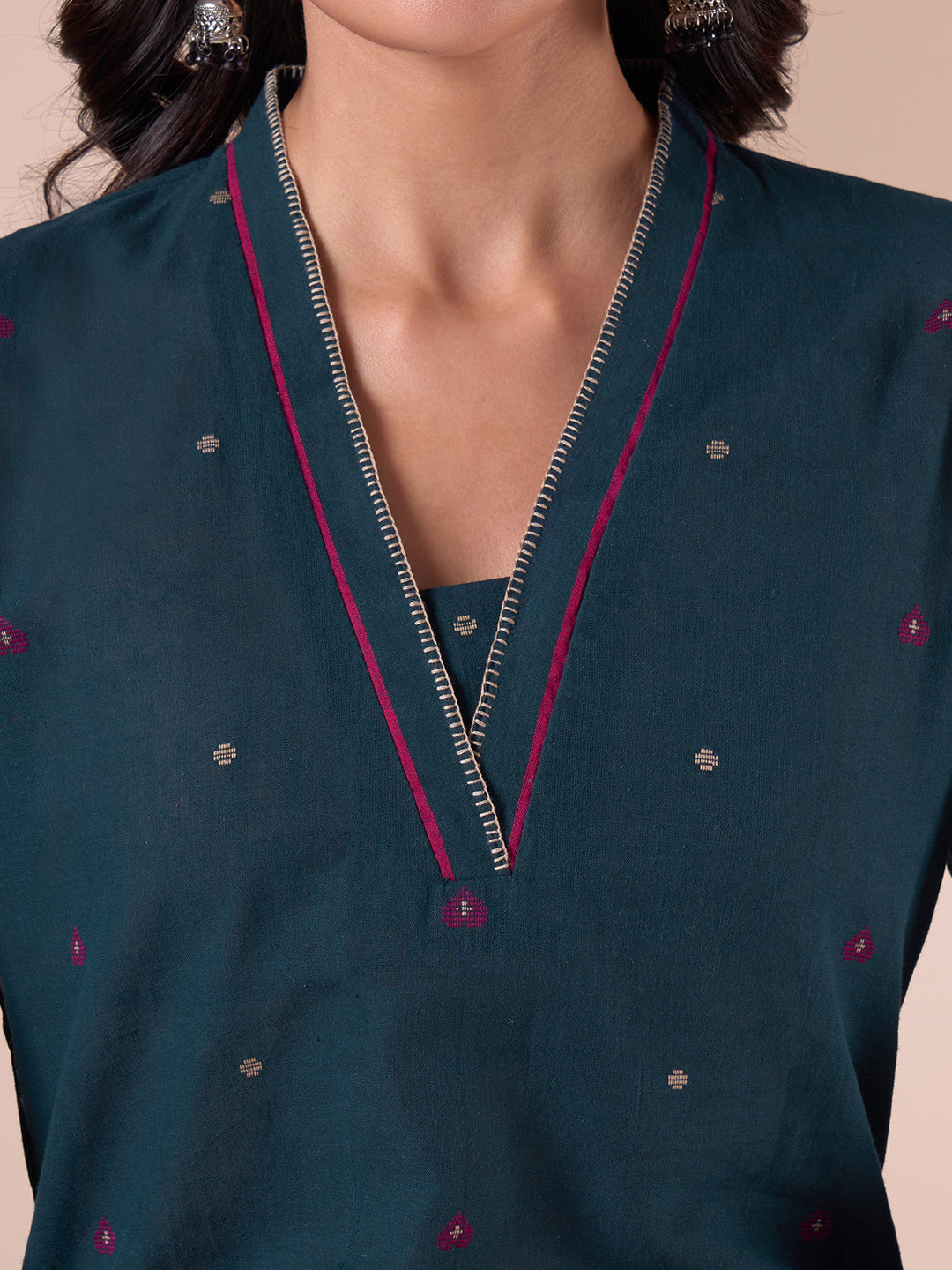 Straight Fit Cotton Dobby Kurta with Handwork and Contrast Selvedge Neckline.