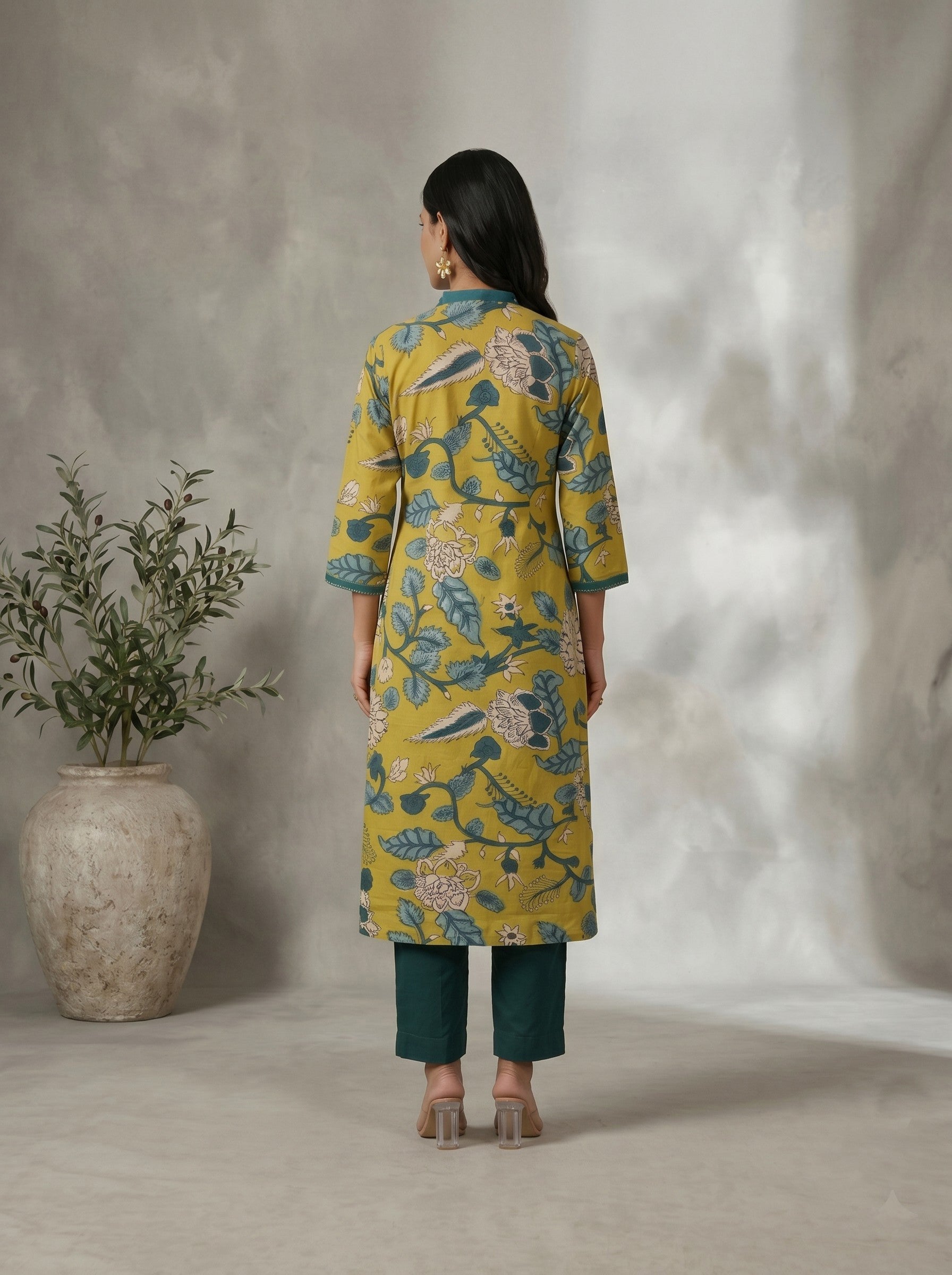 Mustard Floral Printed A-Line Cotton Kurta with Elegant V-Neck Mirror Detailing.