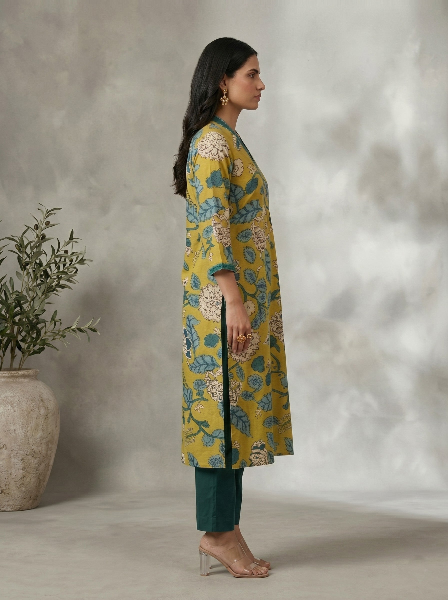Mustard Floral Printed A-Line Cotton Kurta with Elegant V-Neck Mirror Detailing.