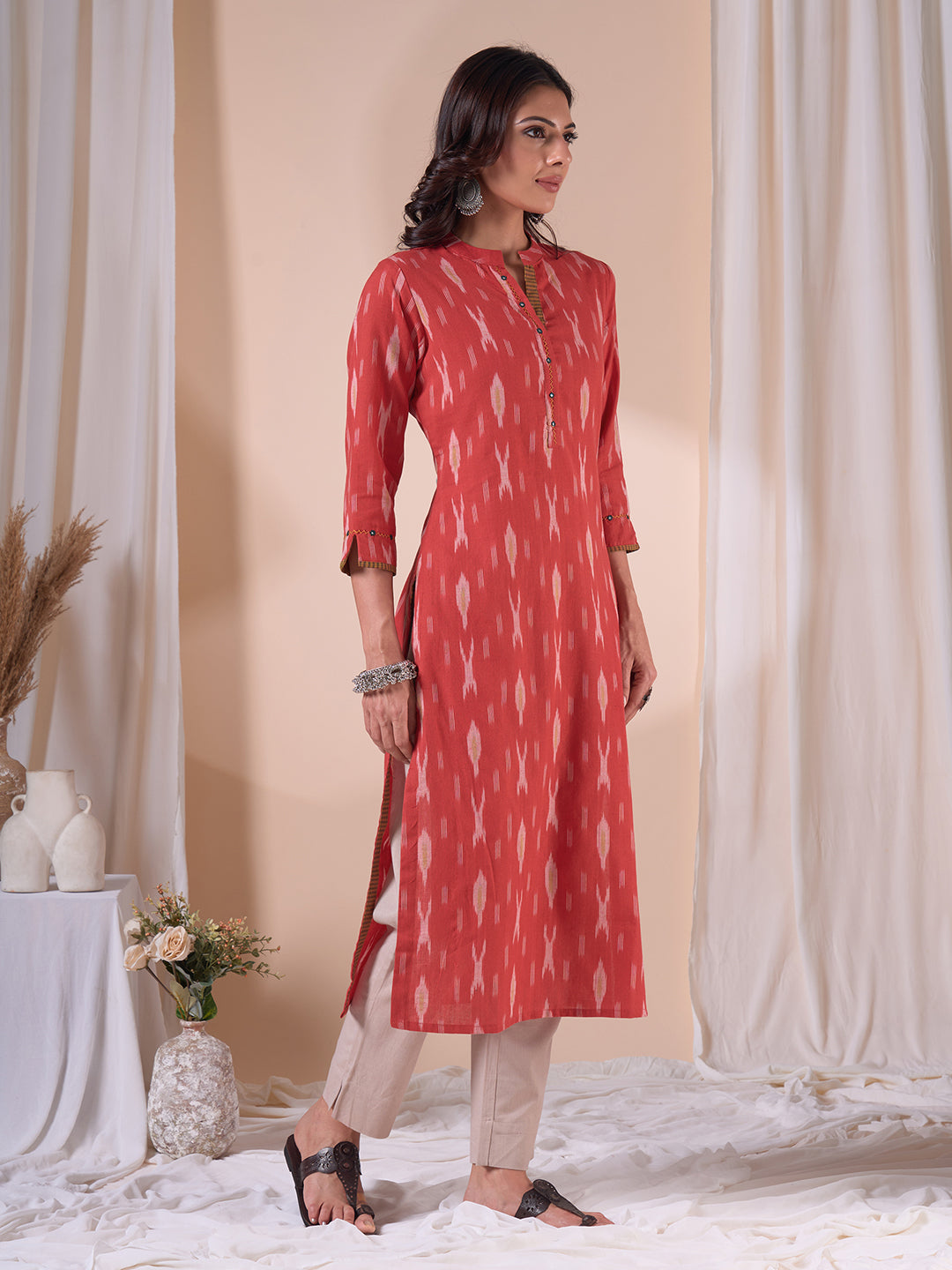 Straight Fit Cotton Ikat Weave Kurta with Checkered Trim & Handwork Detailing.