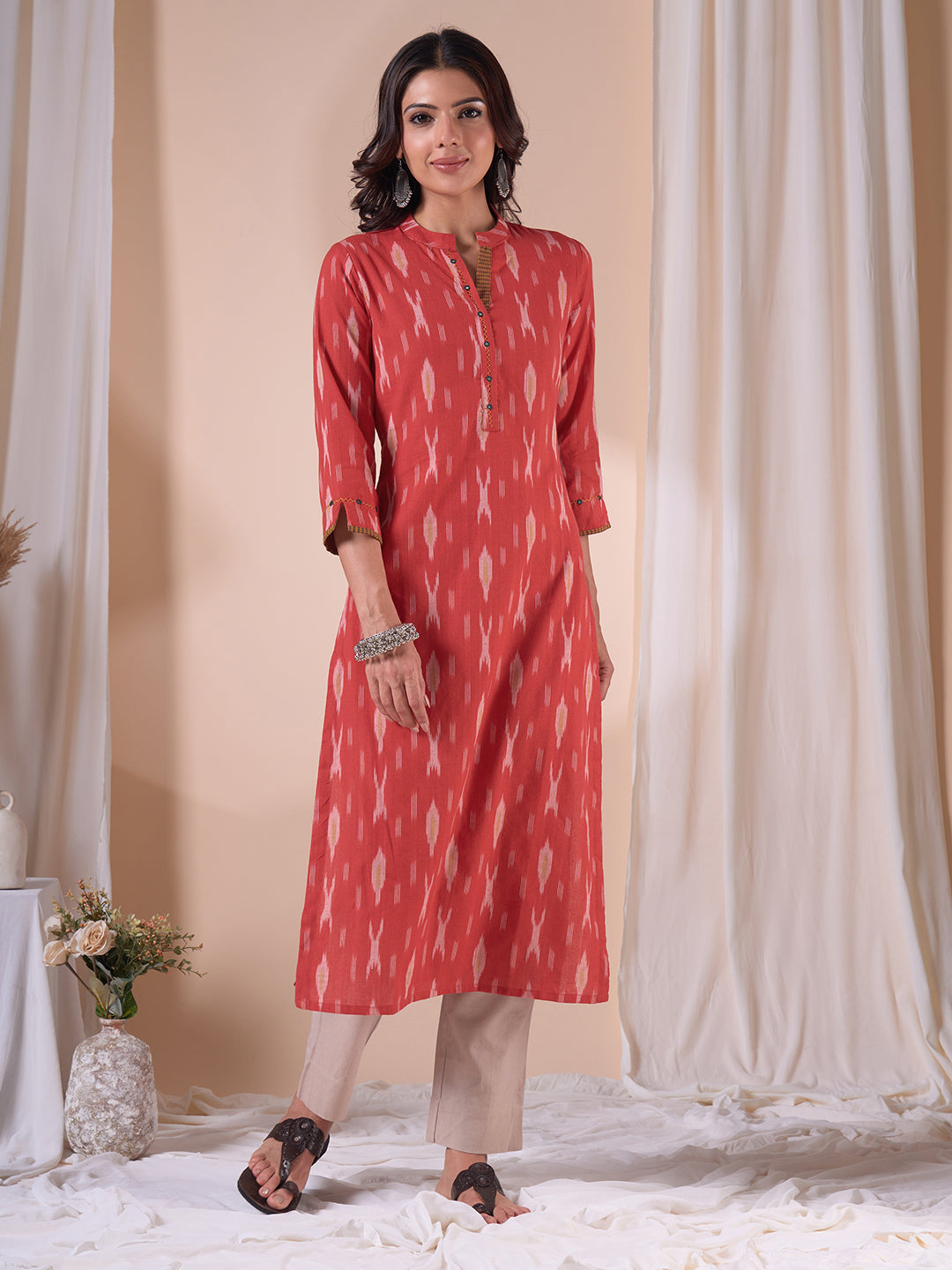 Straight Fit Cotton Ikat Weave Kurta with Checkered Trim & Handwork Detailing.